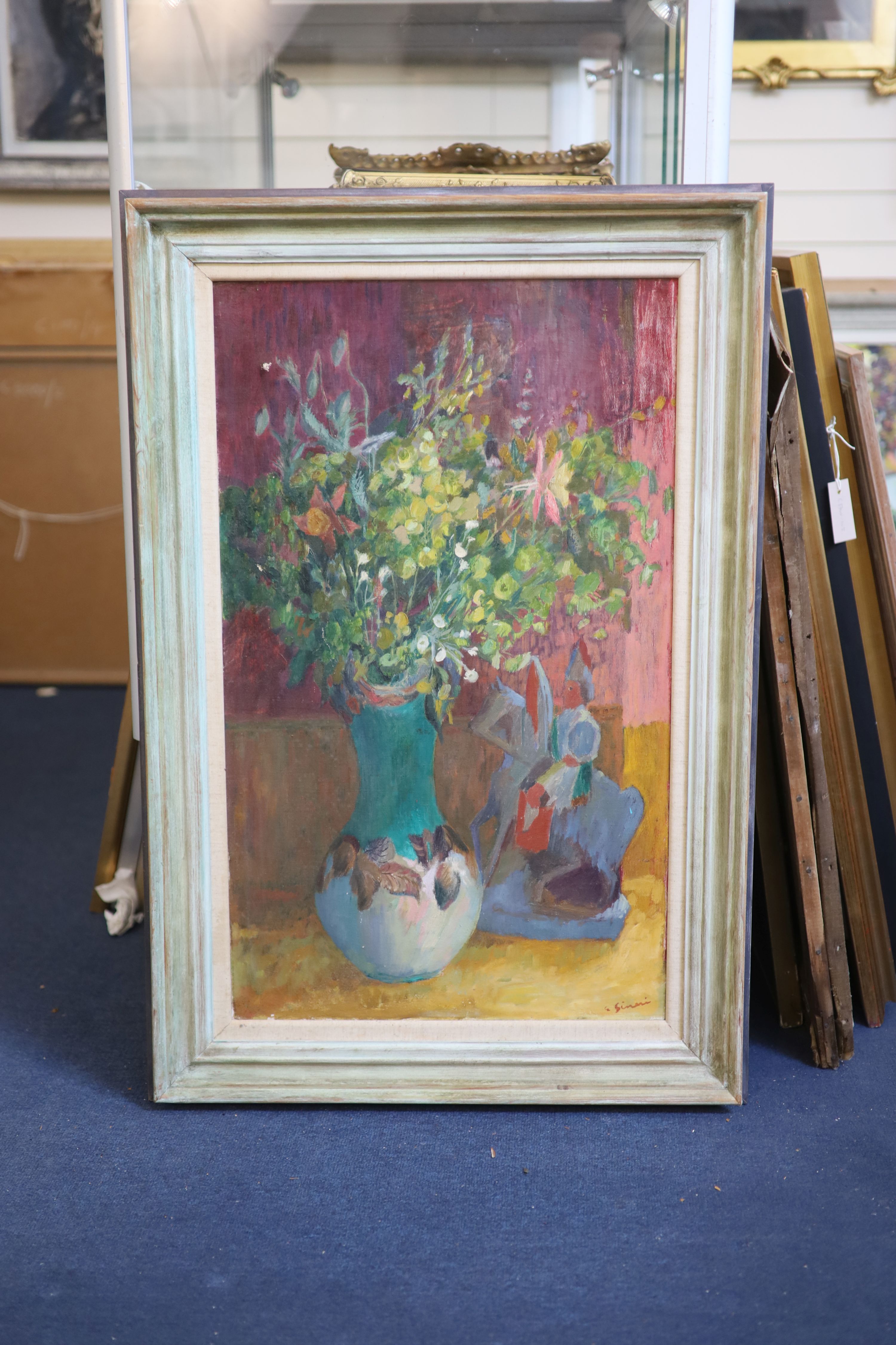 Edna Ginesi (1902-2000), oil on canvas, Still life of flowers in a vase with a figure alongside, signed, 75 x 45cm